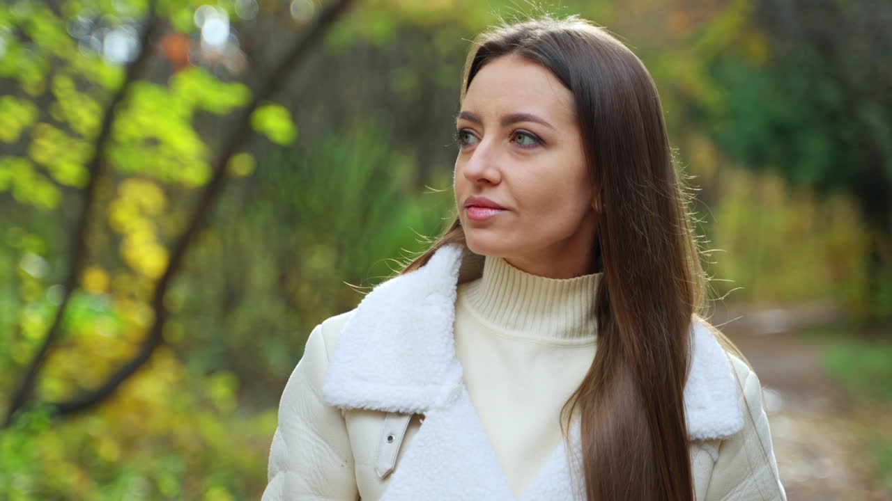 Woman in Autumn Park with Coffee