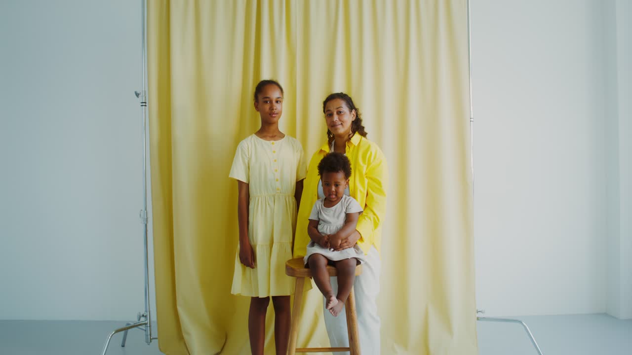 Portrait of a Mother and Her Daughters