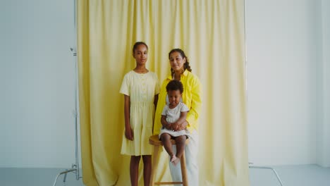 portrait of a mother and her daughters