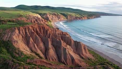 sellicks beach cliffs and green hills orbiting drone aerial shot near adelaide, fleurieu peninsula, south australia