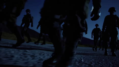 soldiers marching at night