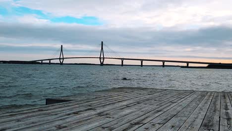 timelapse establishing shot of one of the longest bridges in europe, the cable-stayed replot bridge in finland