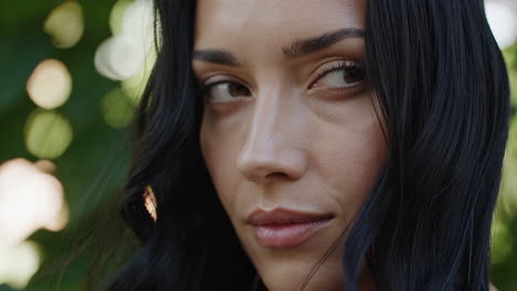 close-up portrait of a woman in nature