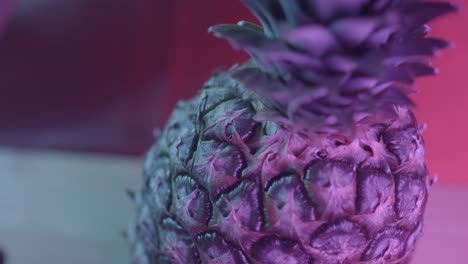 cutting a pineapple