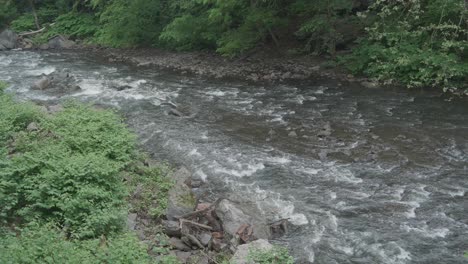 the wissahickon creek, high angle, flowing over rocks and stones