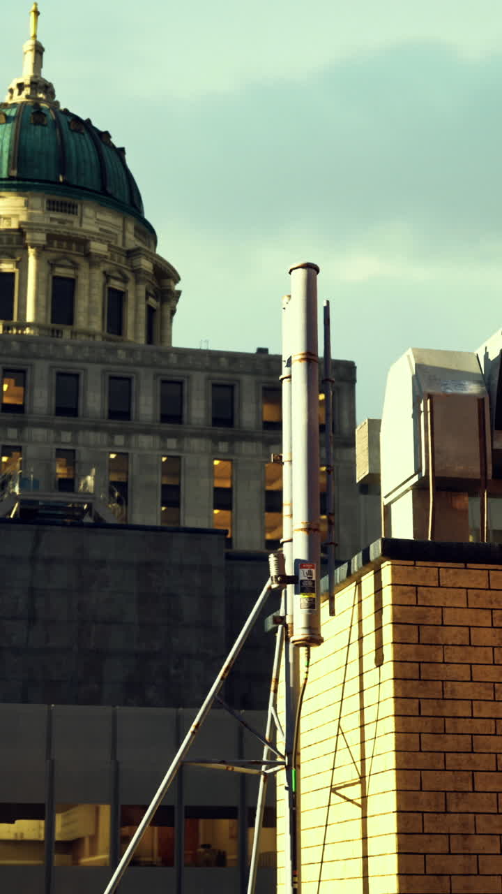 Urban backdrop featuring architectural buildings under a golden sunset