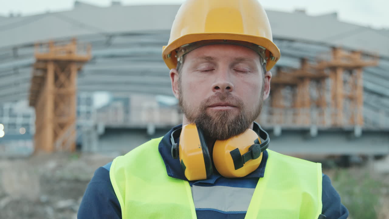 Portrait of Male Worker Posing on Construction Site
