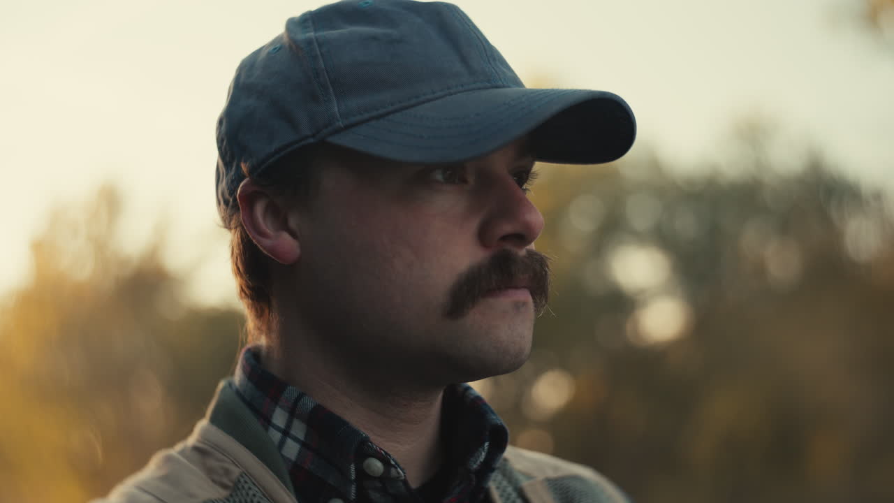 Man in a Baseball Cap Outdoors