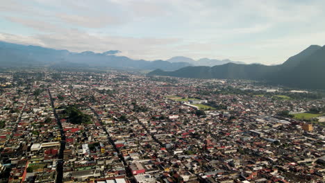 Aerial-view-of-the-town-of-Orizaba-and-its-mountains-and-churches