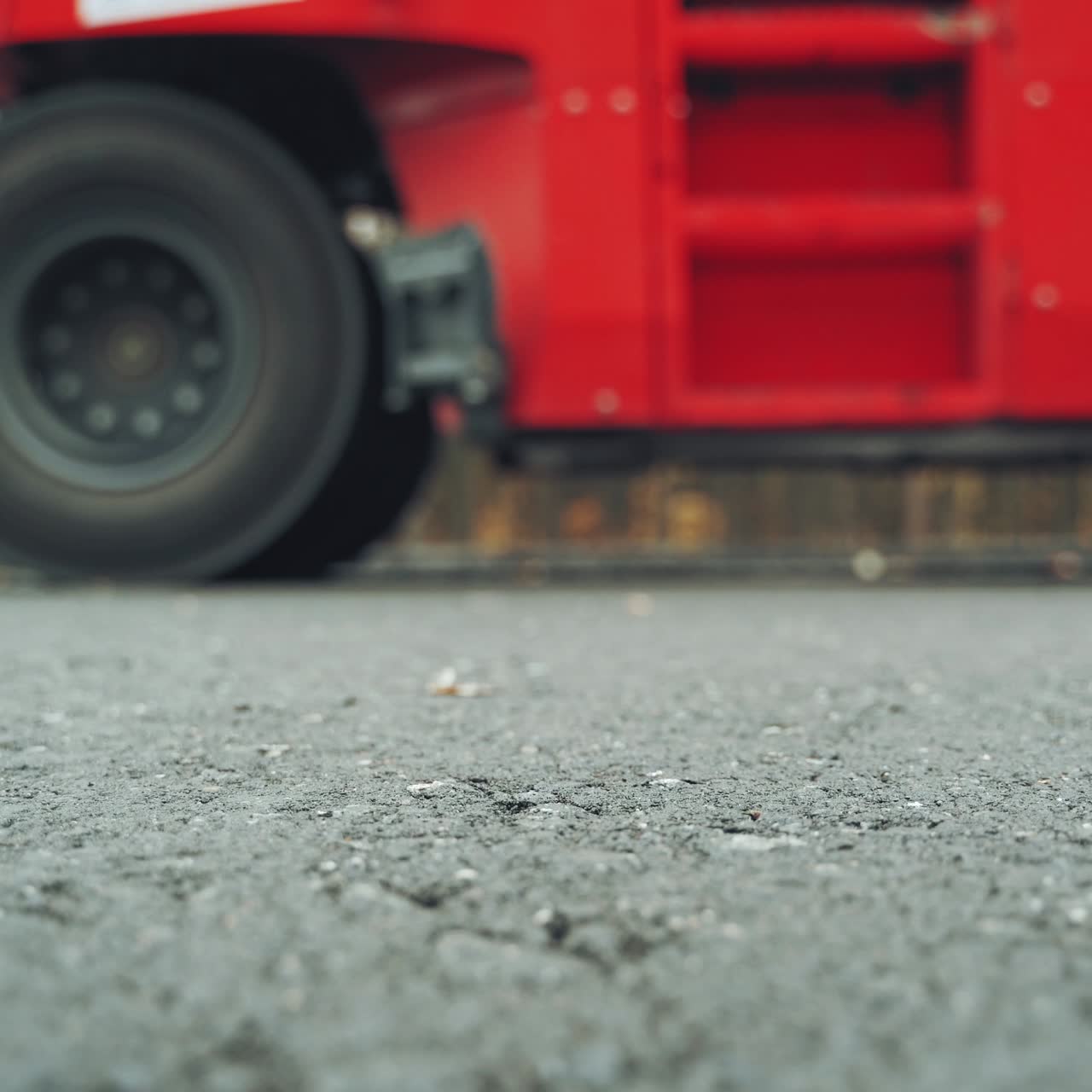 Asphalting of road with steamroller