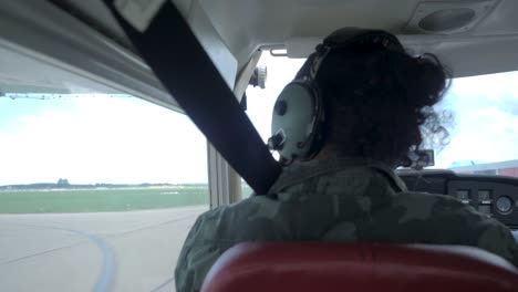 a slow motion shot of a uniformed pilot and copilot