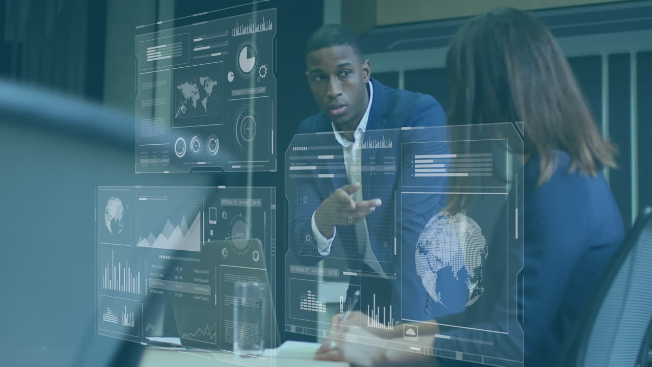 Animation of data processing over diverse businessman and businesswoman discussing at office