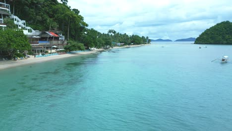 Drone-Shot-of-Luxury-5-Star-Beach-Resort-in-El-Nido,-Philippines