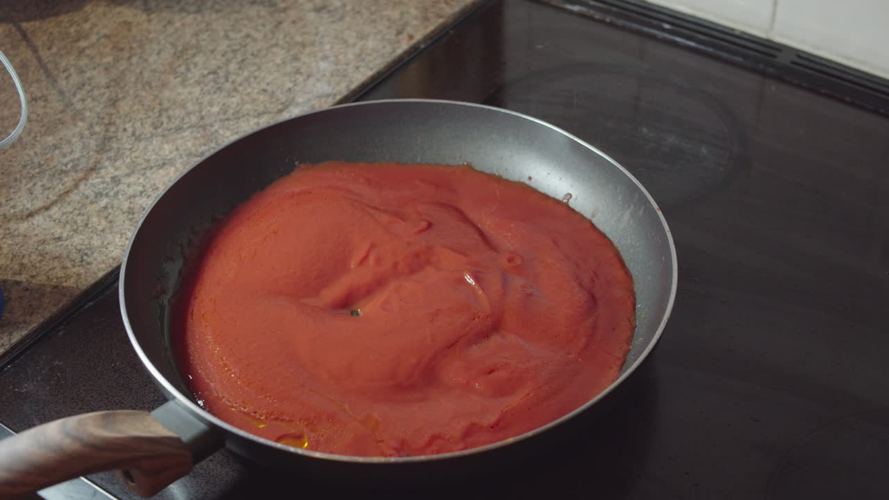 Passata bubbling in a pan