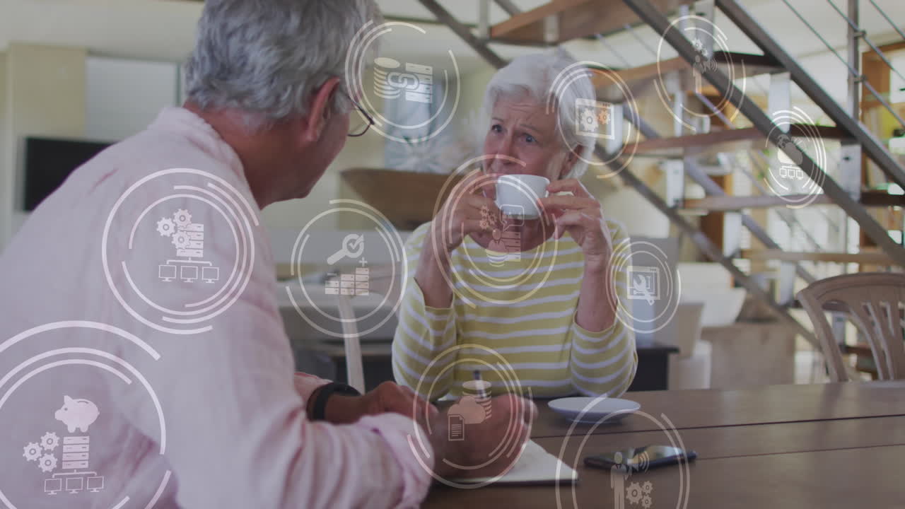 animación de la red de conexiones con iconos sobre la pareja caucásica senior en casa