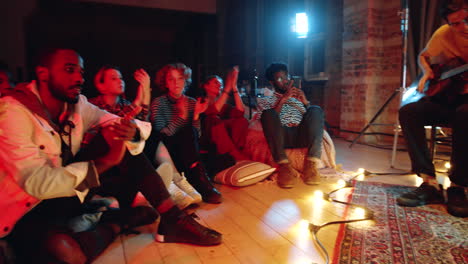 People-Applauding-to-Music-Band-during-Concert