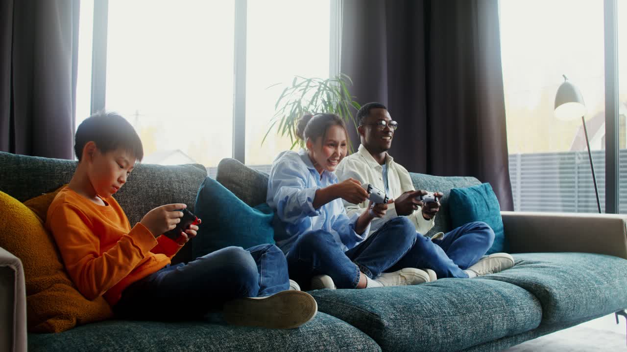 Family enjoying video games together at home