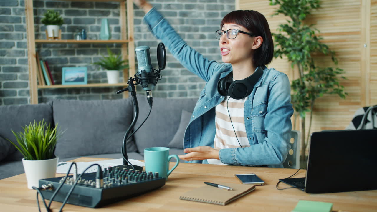 Woman Recording a Podcast at Home
