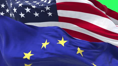 the flags of the european union and the united states of america waving with a green screen background. seamless animation. international relations and diplomacy.