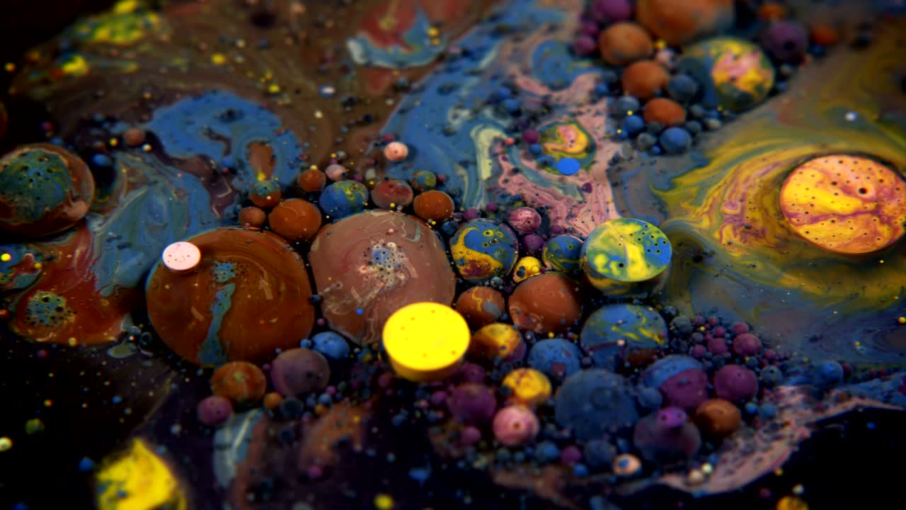 Abstract Colorful Acrylic and Food Paint Bubbles on Water