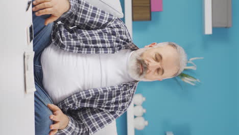 Vertical-video-of-Old-man-getting-breakup-texting-gets-upset.