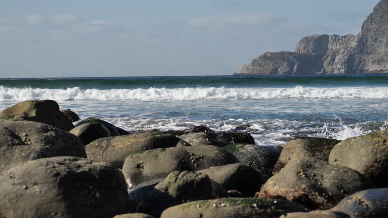 Waves splashing into the rocks in the coastline