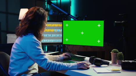 photo editor using green screen monitor and graphic tablet