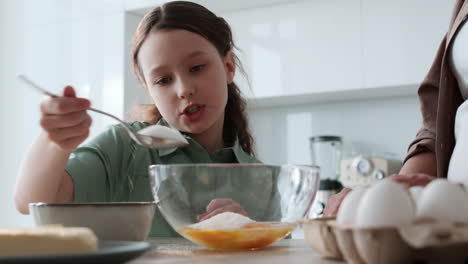 grandma and girl baking