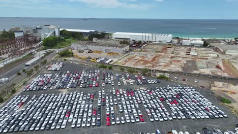 aerial view of a massive car parking lot near the ocean