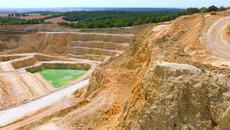 Limestone-Mine-With-Quarry-Lake---aerial-drone-shot