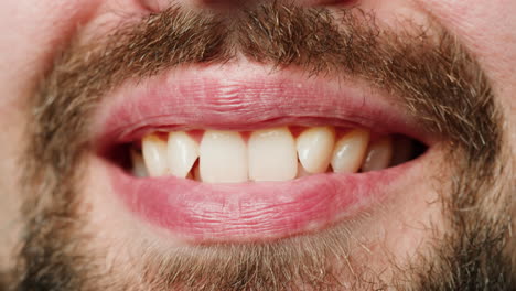 close-up of a smiling man's mouth and teeth