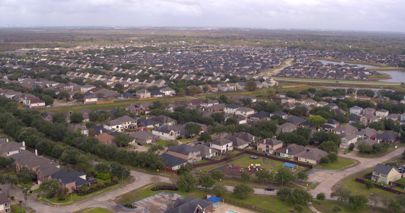 Wide angle drone view of suburban neighborhood in Missouri City, Texas