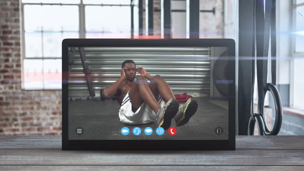 Animação de tablet mostrando um homem afro-americano se exercitando. Coronavírus se espalhando