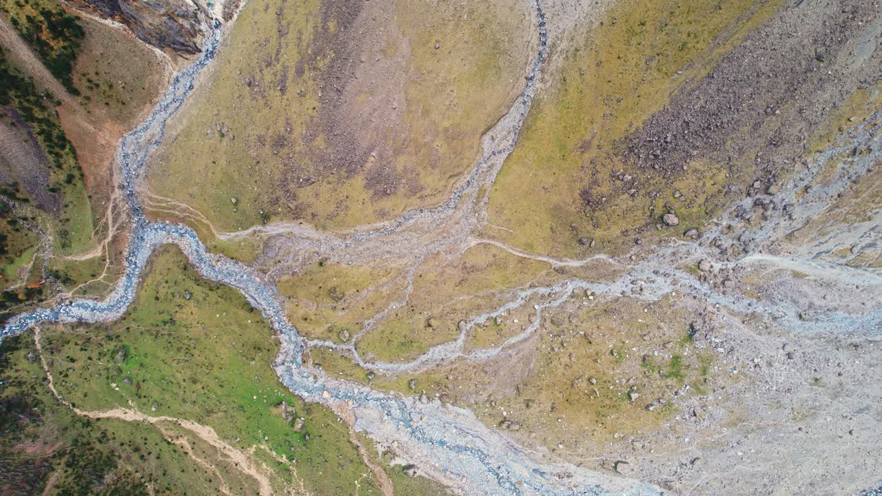 Aerial view of Cirque de Gavarnie landscape with river and hills