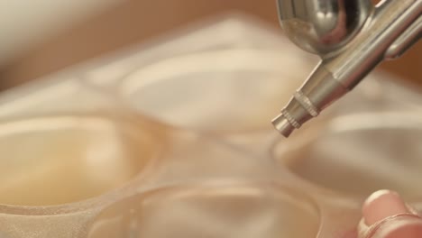 airbrushing chocolate molds