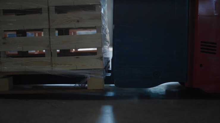 Closeup storehouse loader moving delivery export package crates sorting boxes