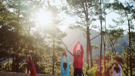 trainer and kids performing yoga 4k