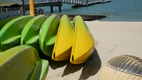 Green--surfboard-at-the-beach