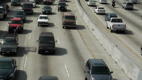 traffic moves slowly along a busy freeway in los angeles 19