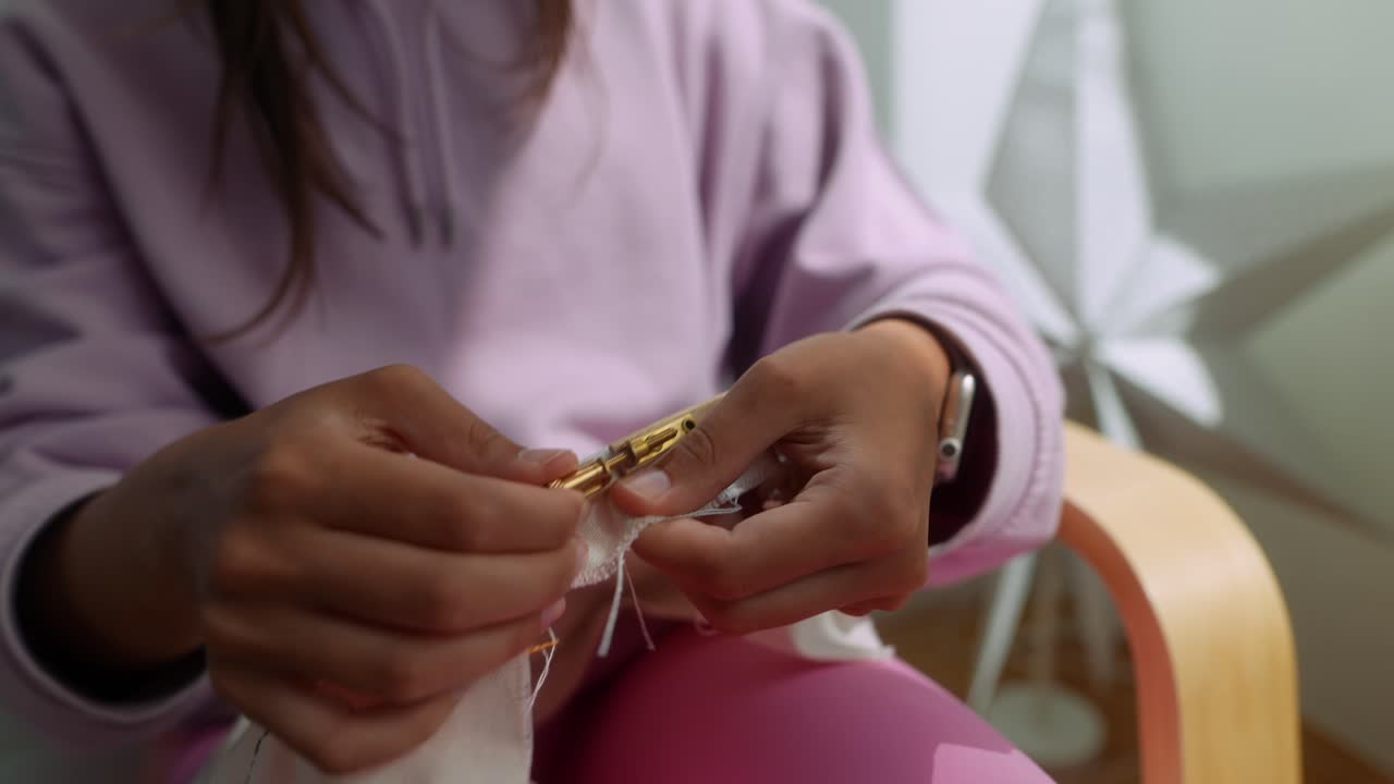 Woman's Hands Preparing Fabric for Embroidery in a Hoop