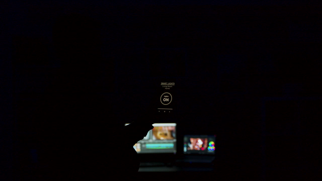 Man uses smartphone app to control lights