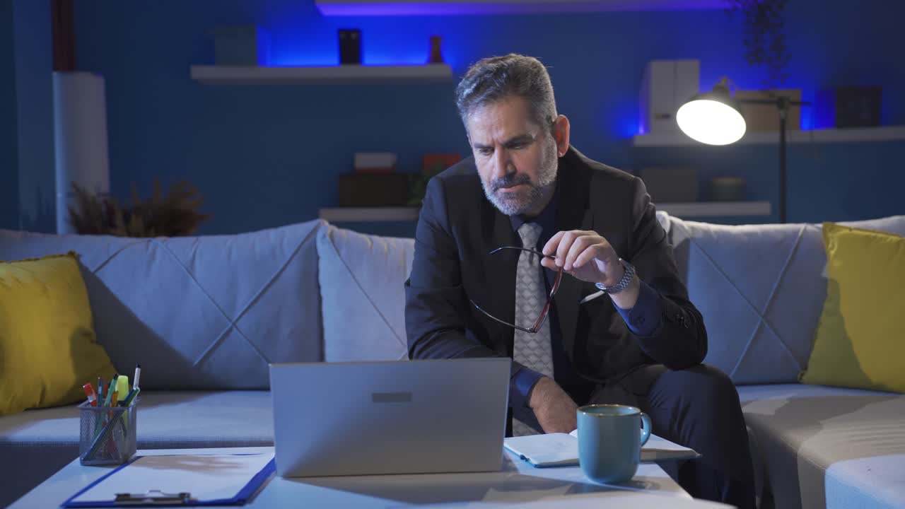 Focused businessman entrepreneur typing on laptop while doing business.