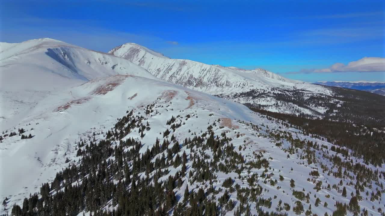 Hoosier Pass winter wilderness nature backcountry Breckenridge Colorado aerial drone Quandary Peak Alma Fairplay Blue River Rocky Mountains morning blue sky 14er December January forward motion
