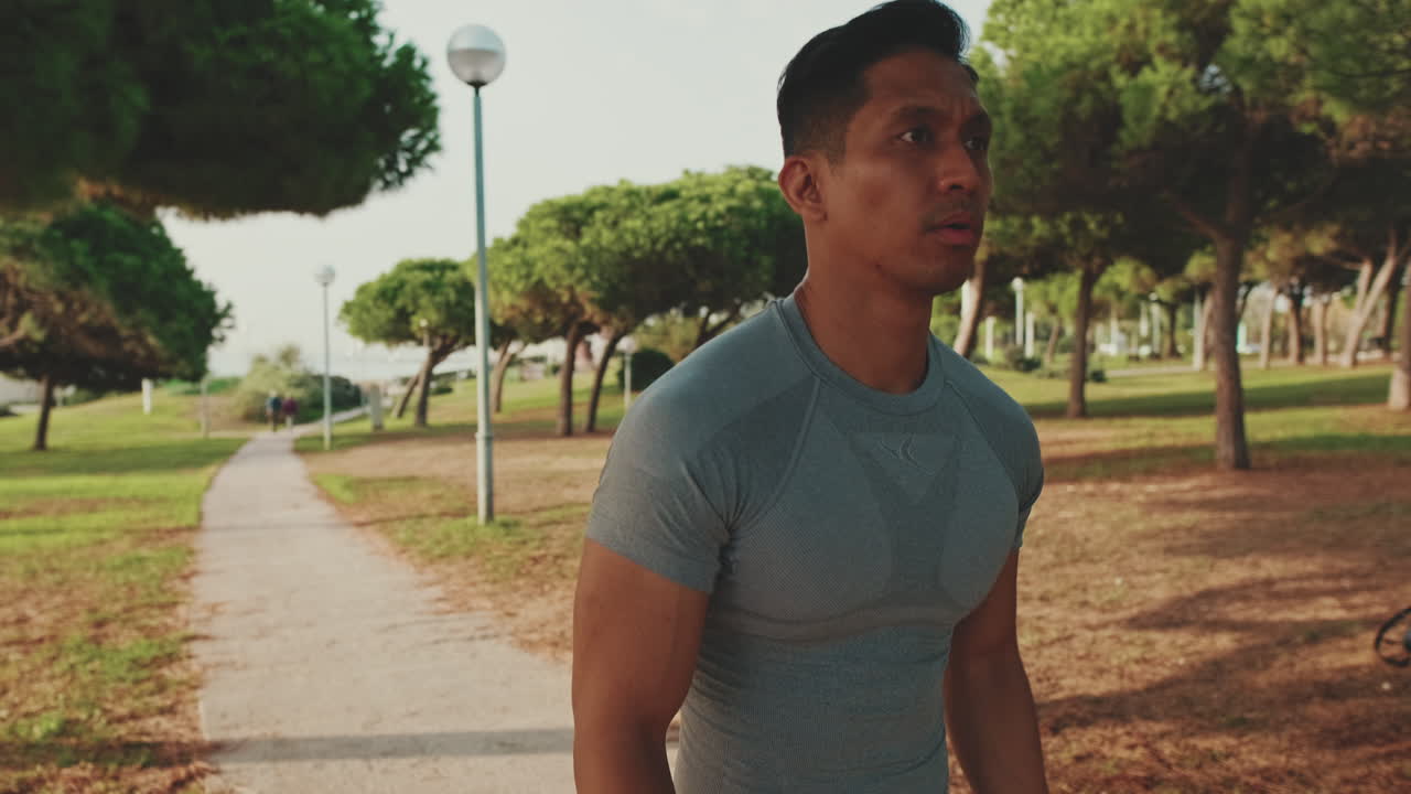 Man exercising outdoors in a park