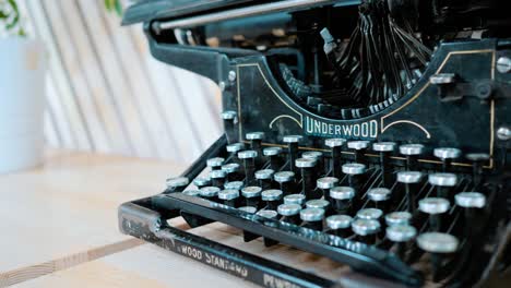 vintage typewriter on the table in the office. close-up.