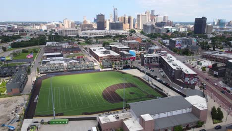 aerial view of detroit skyline and sports field
