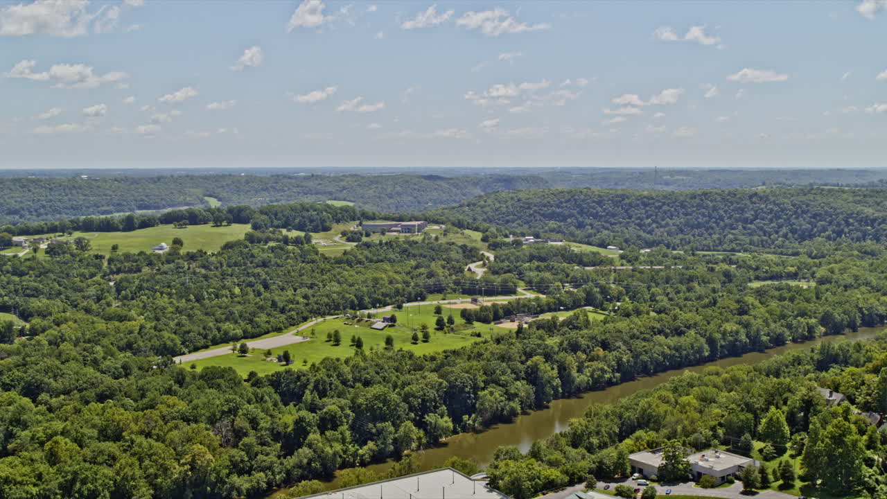 Frankfort Kentucky Aerial fly past of the Capitol Statehouse to reveal the lush green countryside - 6k professional footage - August 2020