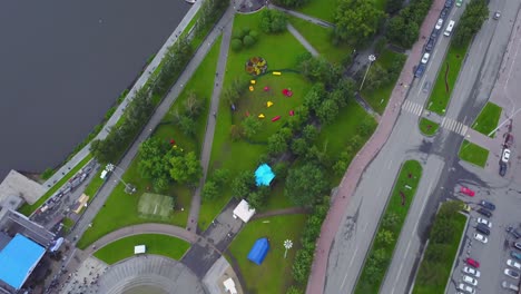 aerial view of a city park with festival activities