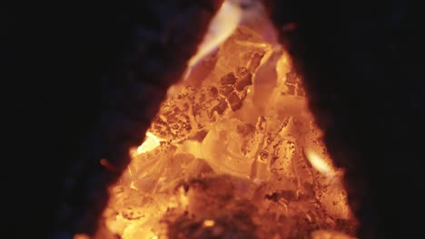 burning hot firewood, warming up in winter season, close up view