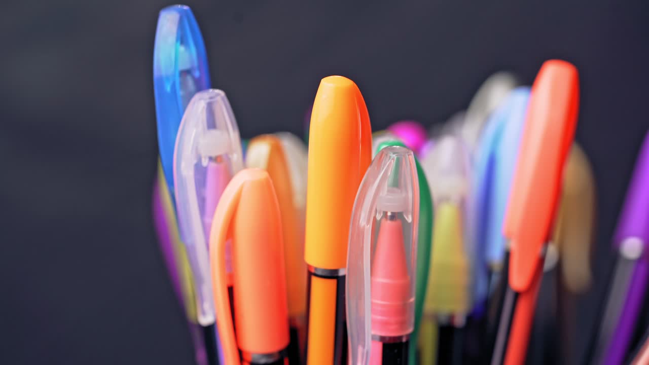 Many different colored pens.Tools for drawing, education, school, creativity.
